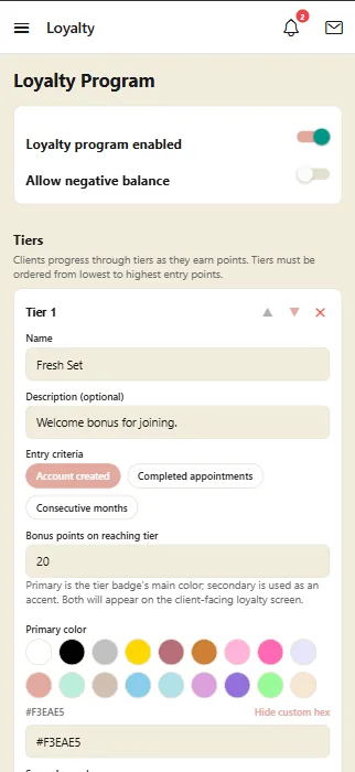 The loyalty program settings screen, showing tier rules and bonus points configured by the salon owner